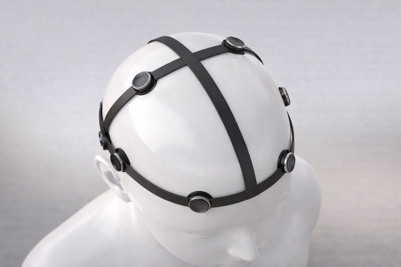 Concept rendering of The Vise from above, showing crossing straps and round twist-adjust pressure pads